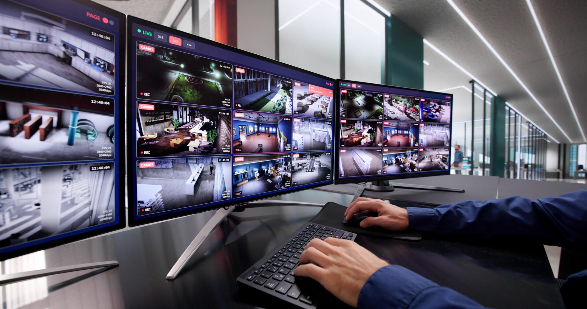 Computer Operator Monitoring CCTV Footage For Advanced Security System