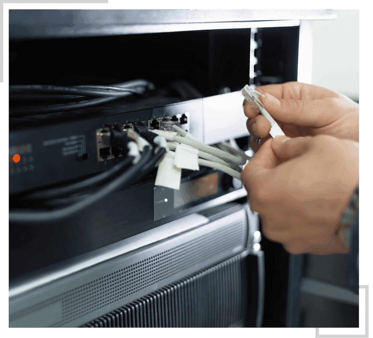 Hands connecting network cables