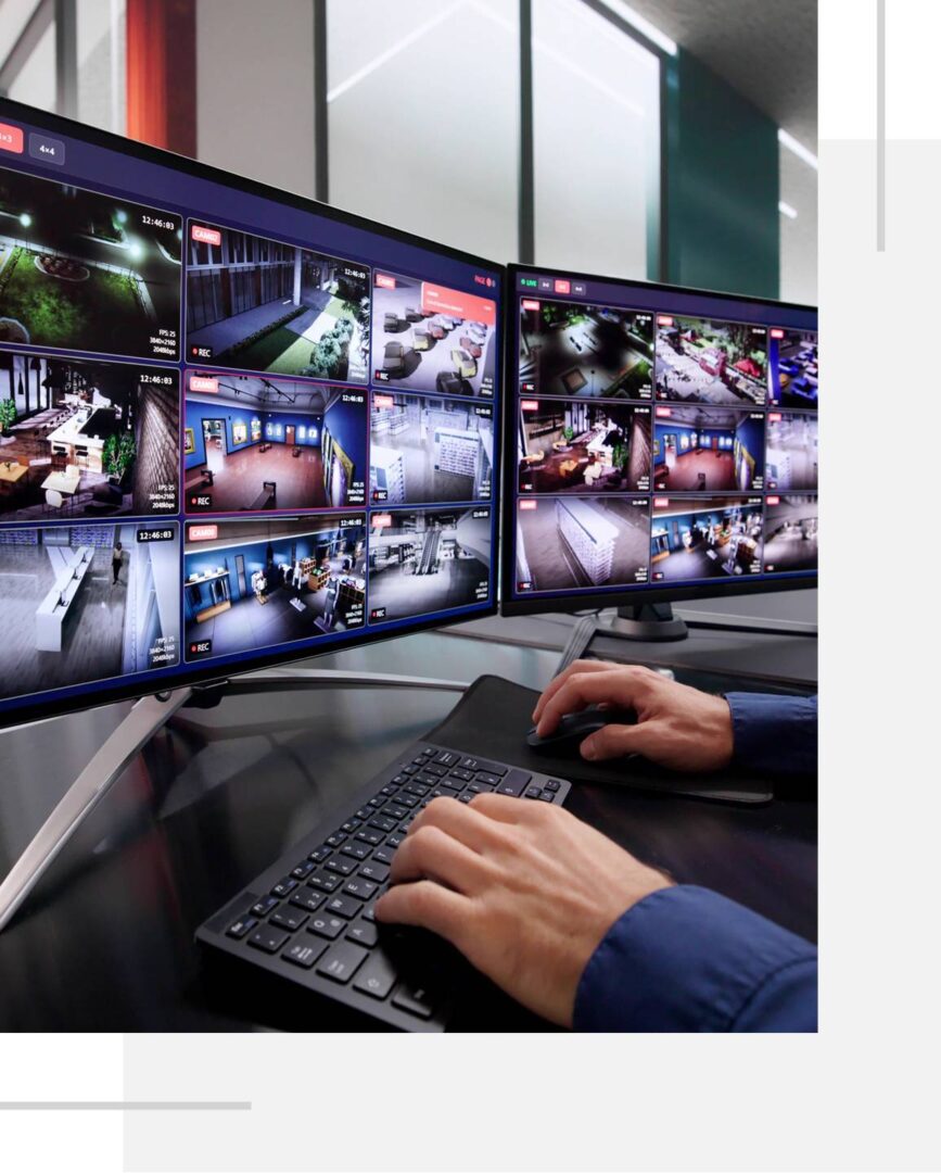 Dual screens showing surveillance video feed